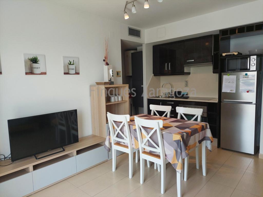 Apartment with a tourist rental licence, ideal as an investment property or for personal use.The apartment offers a practical and functional layout, featuring a fully equipped open-plan kitchen connected to the dining area, with direct access to a terrace where you can enjoy the outdoors. It also includes one double bedroom and a bathroom with a bathtub.The property comes with a private parking space and access to a communal outdoor swimming pool, adding both comfort and value. It is located on one of the main avenues of Deltebre, just 10 km from the beaches of Riumar, known for their fine sand, natural dunes and exceptional natural surroundings.Deltebre, in the heart of the Ebro Delta, offers a unique natural environment of rice fields, lagoons and unspoilt beaches. Its peaceful atmosphere, excellent quality of life, outstanding gastronomy and full range of services make it an ideal place both for year-round living and for holiday stays. The area's main economic activities include agriculture—particularly rice cultivation as the driving force of the primary sector—fishing, aquaculture and tourism.The advertised price does not include the costs and taxes arising from the transfer of ownership, such as notary fees, Land Registry fees, administrative fees, or any applicable taxes (Property Transfer Tax, Value Added Tax or Stamp Duty), all of which shall be borne entirely by the purchaser in accordance with current legislation.Real estate agency fees are included in the advertised sale price.To determine and consult the applicable tax regulations, please visit the website of the Catalan Tax Agency: https://atc.gencat.cat/ca/tributsThe information contained in this advertisement is provided for information purposes only and does not constitute a binding offer or contract. Finques Zaragoza Immobiliaria Delta de l’Ebre, S.L. reserves the right to modify, update or amend the contents of this advertisement at any time without prior notice.
